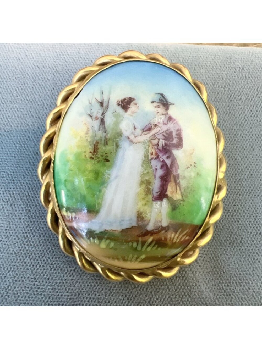 Antique Hand-Painted Porcelain Brooch With Romantic Scene Gold-Tone Frame Oval